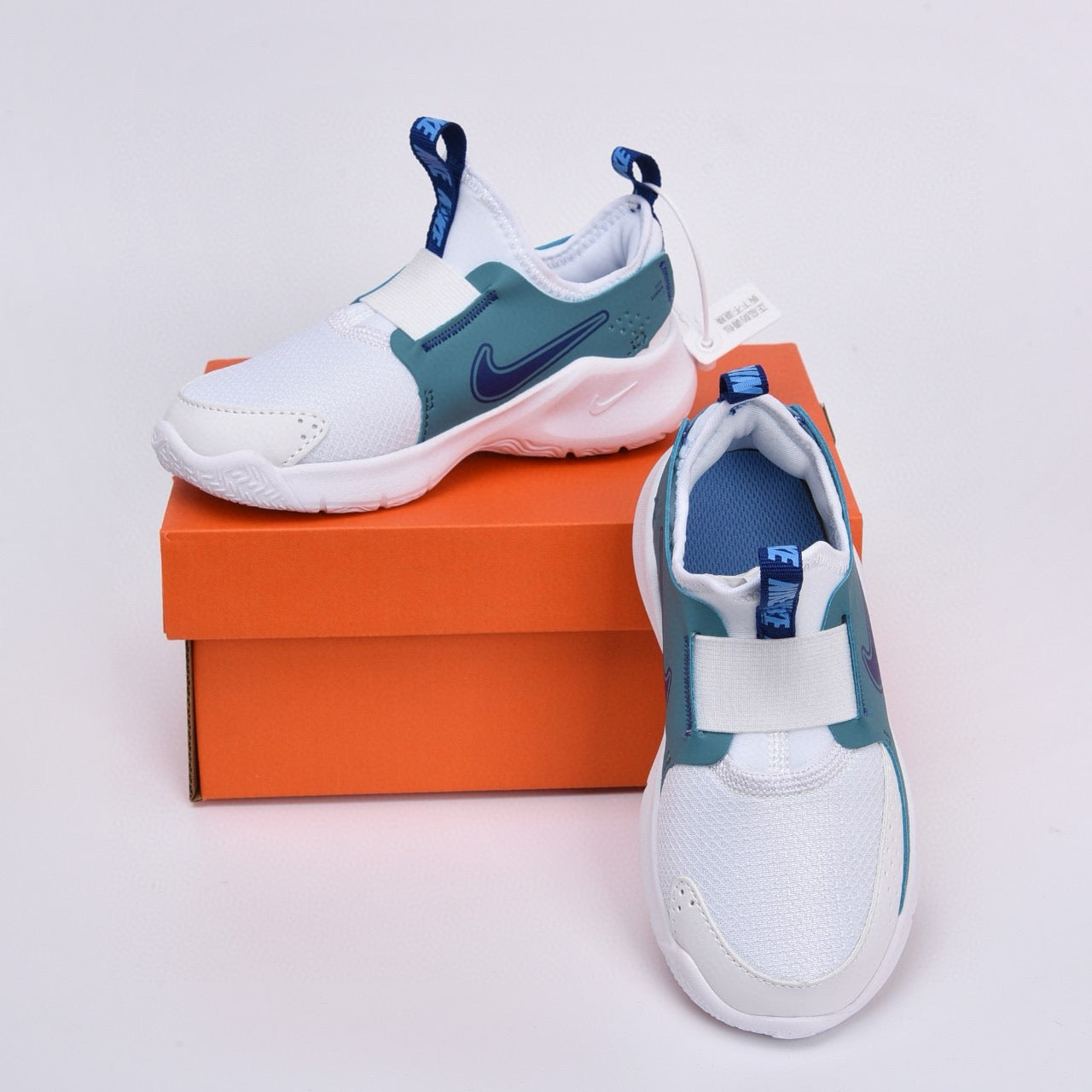 Nike slip-on running shoes"  white, greenish-blue"