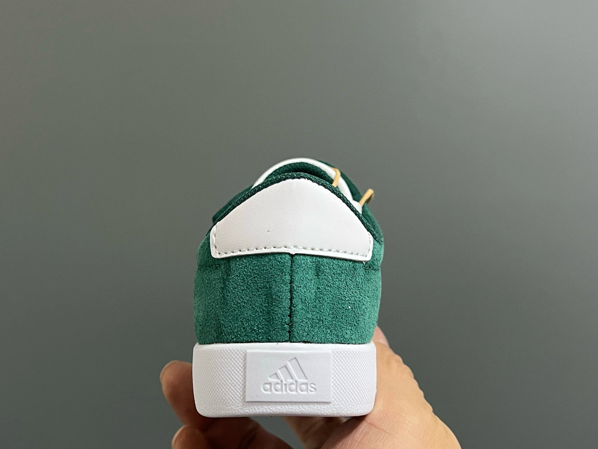 Adidas tennis shoes" dark green"