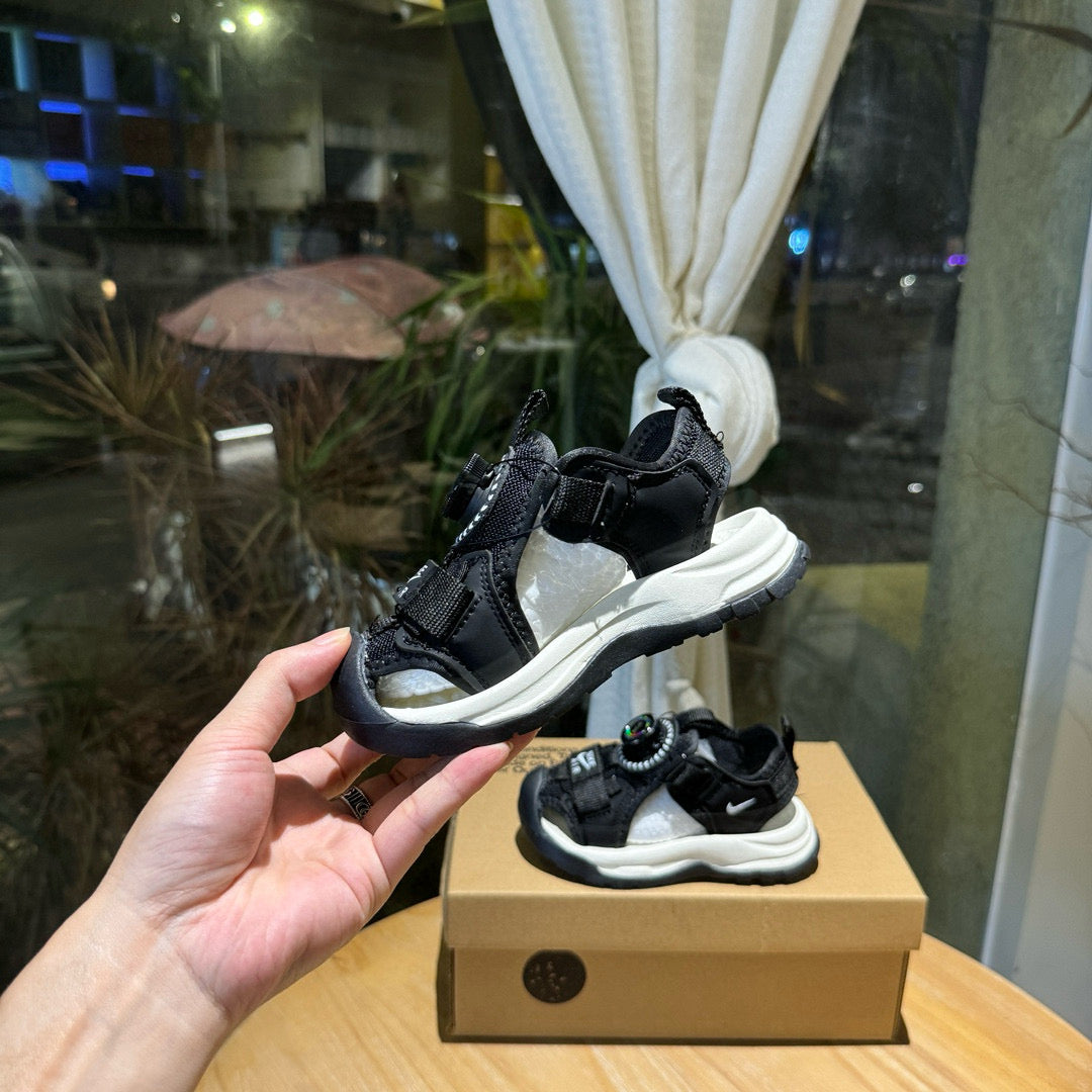 Nike closed toe rotating button sandals" black"