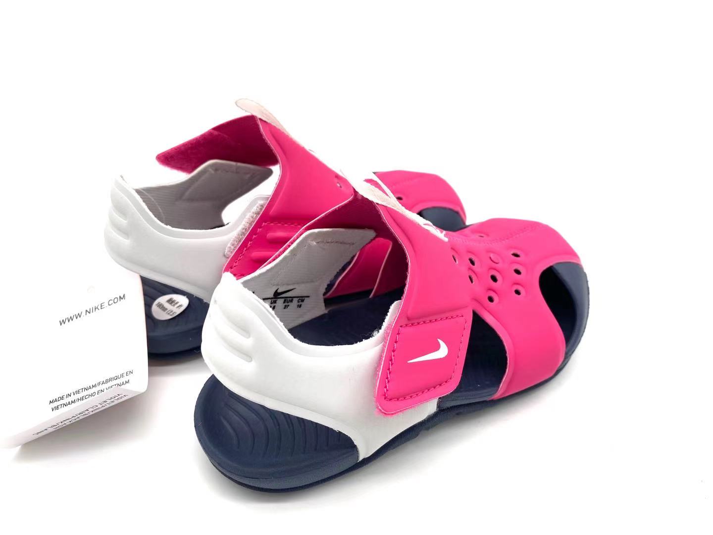 Nike Crocs "bright fuchsia, navy"