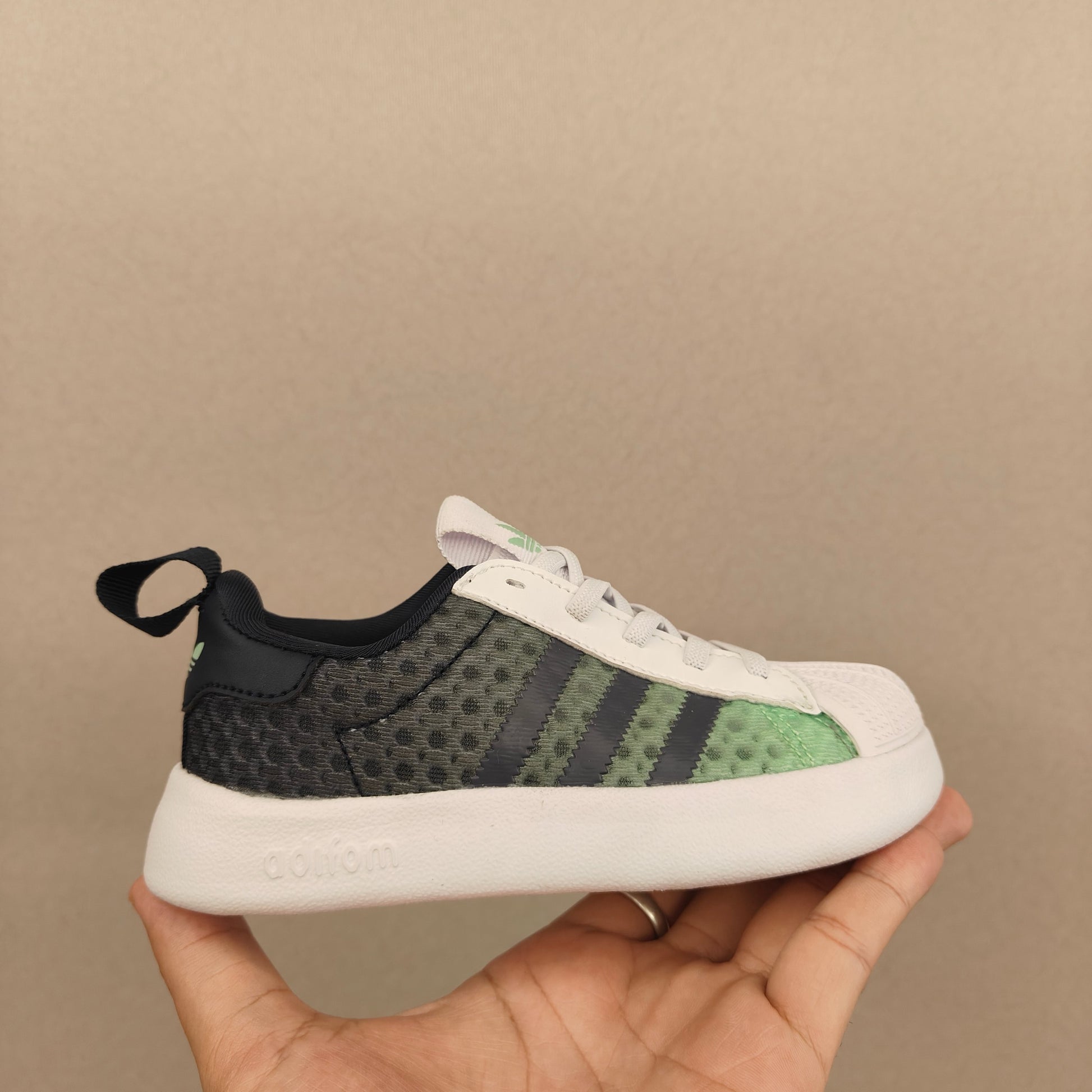 shell toe second generation" dark grey, Green, & White"