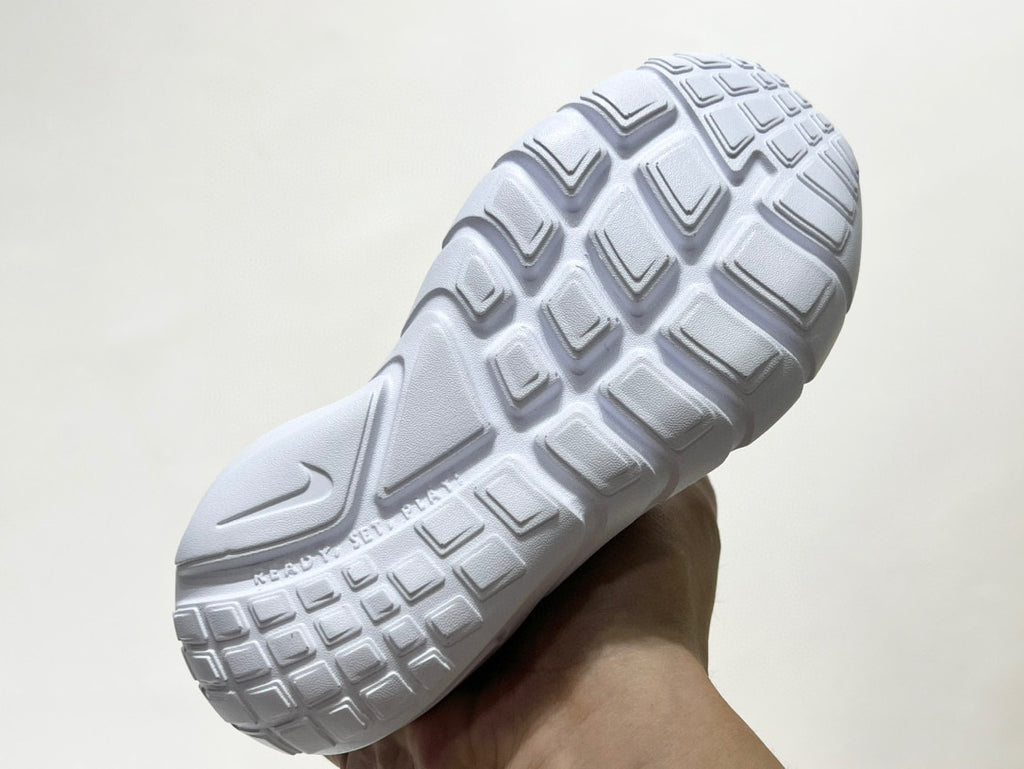 Nike's new barefoot slip" Black, white, green"