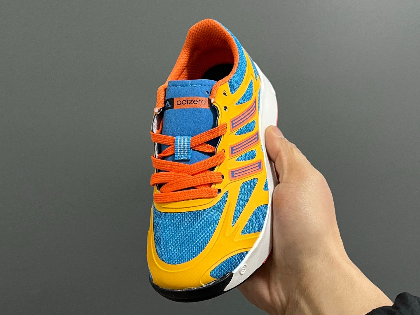 A's new children's shoelace buckle swing sports shoes" Orange, blue"
