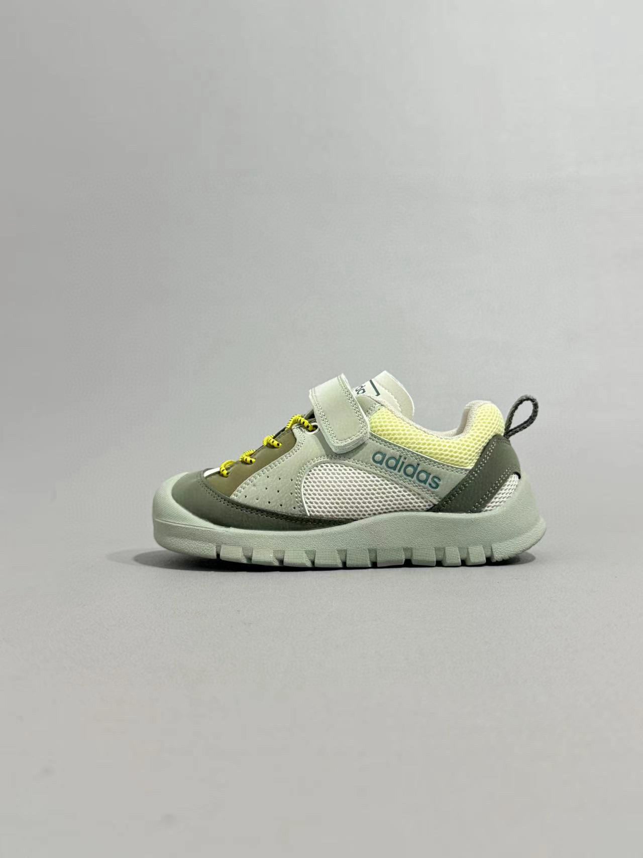 Adidas outdoor hiking shoes" muted green and grey-green.
