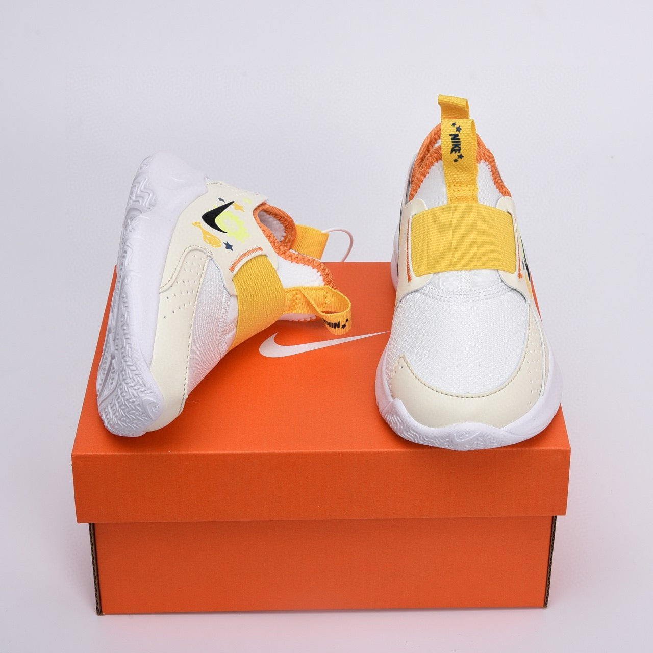 Nike slip-on running shoes" off white, Yellow ,& orange"