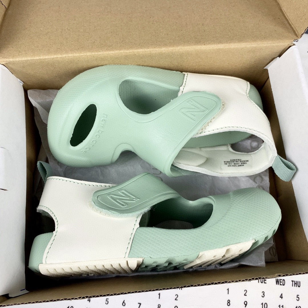 NB airplane hole shoes" seafoam green"