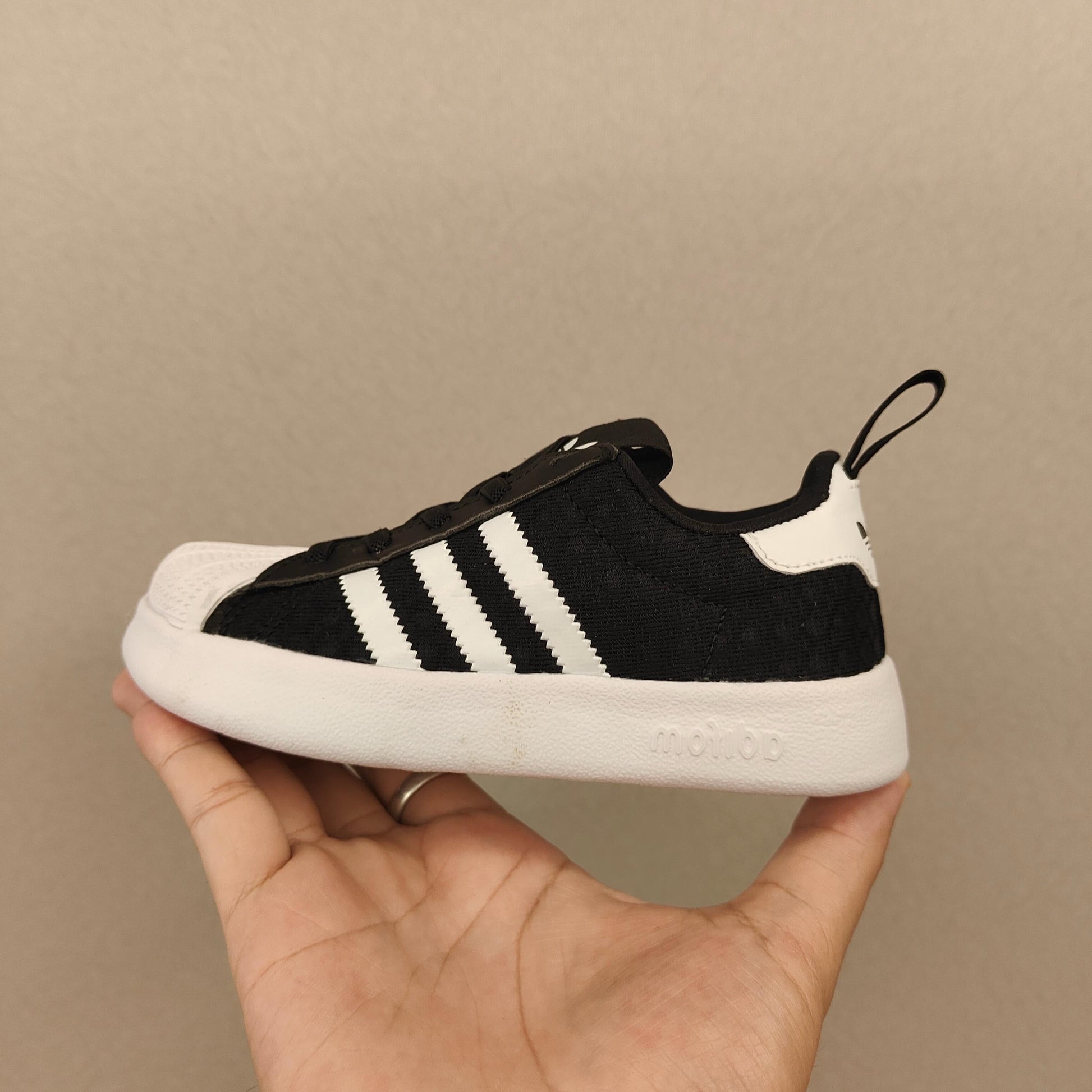 shell toe second generation" Black, white, with line"