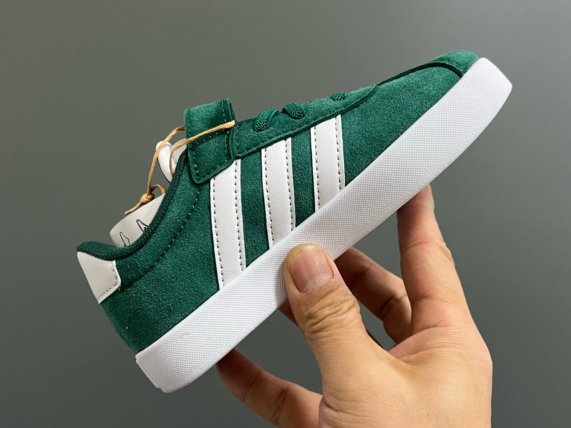 Adidas tennis shoes" dark green"