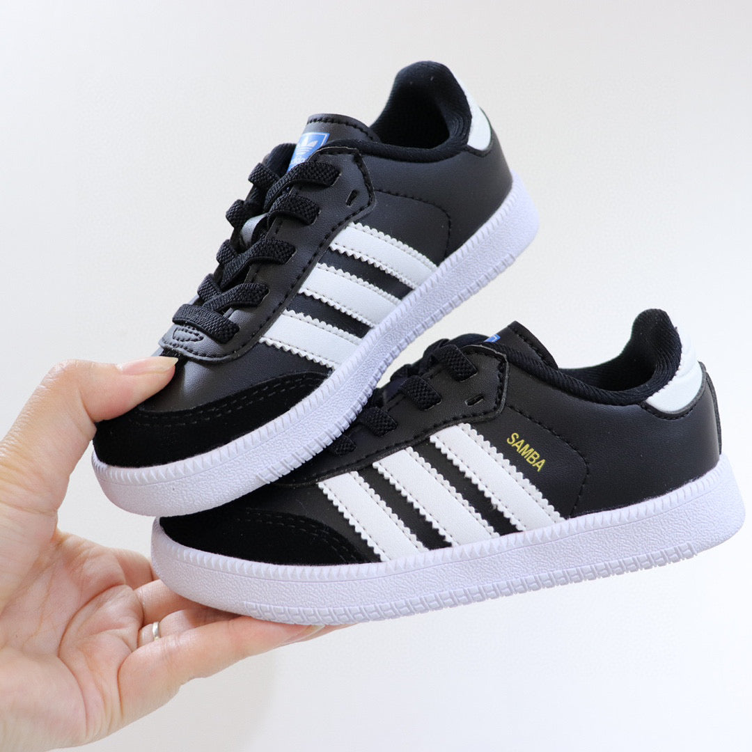 Adidas children's training shoes" black, white"