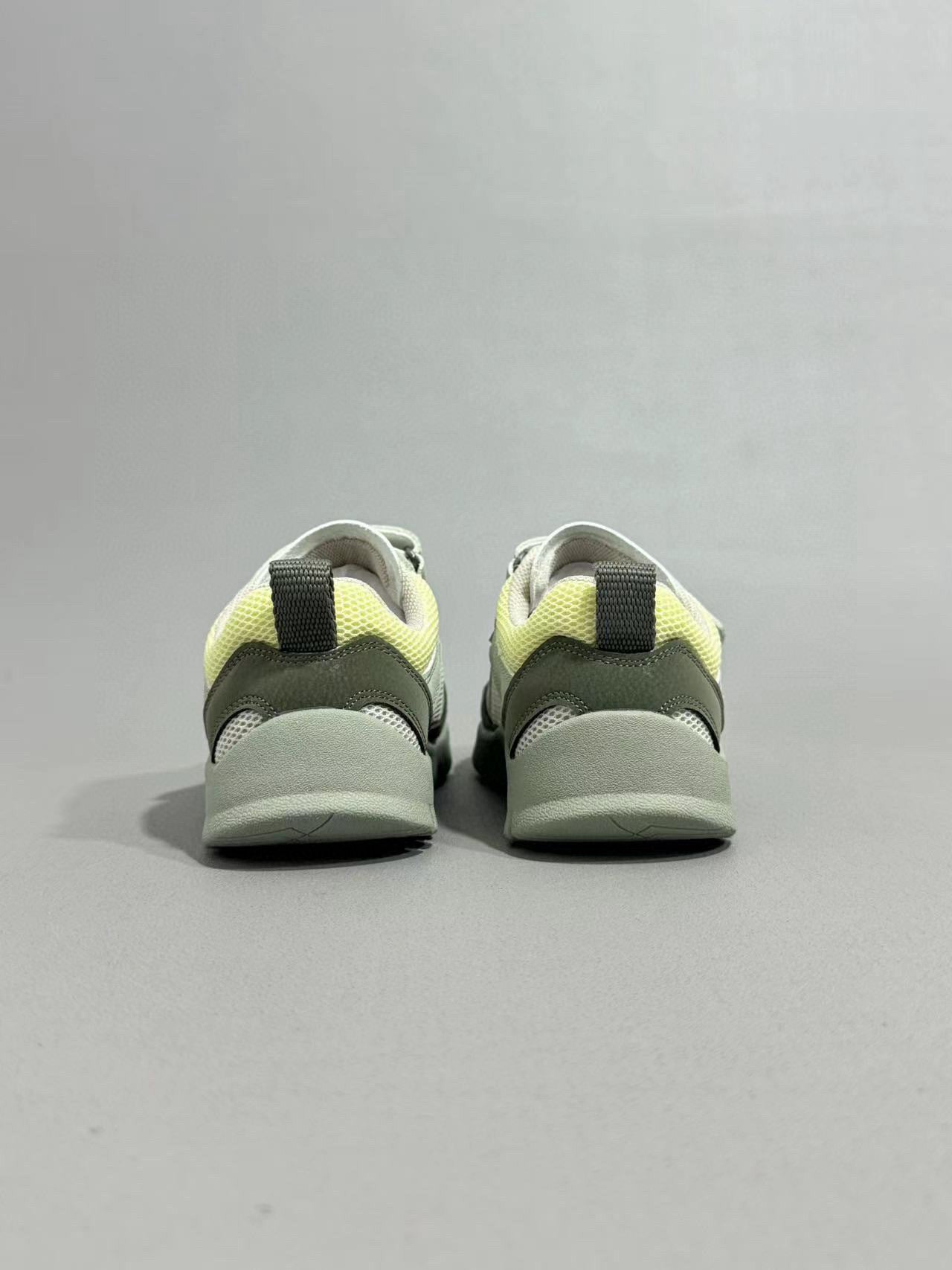 Adidas outdoor hiking shoes" muted green and grey-green.