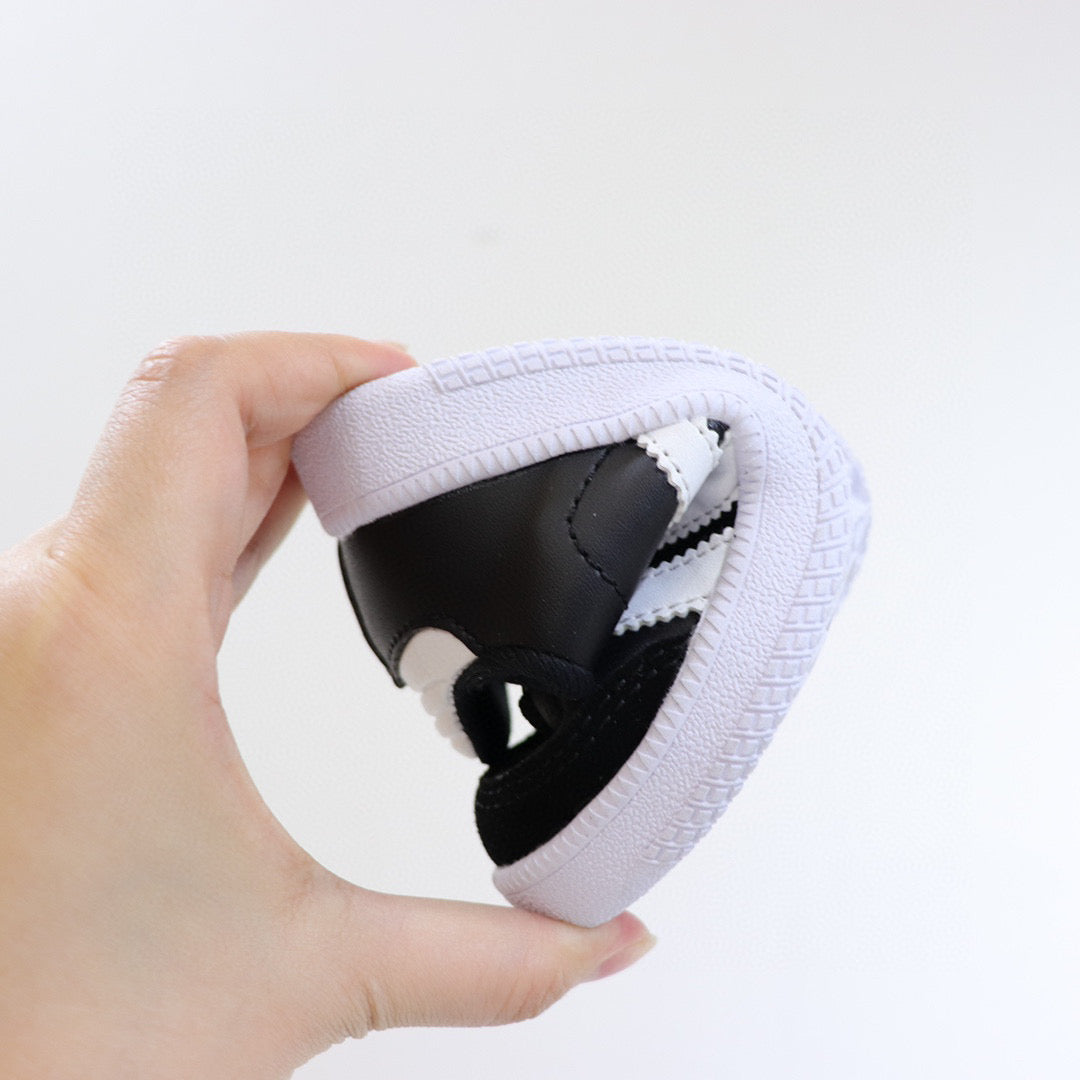Adidas children's training shoes" black, white"