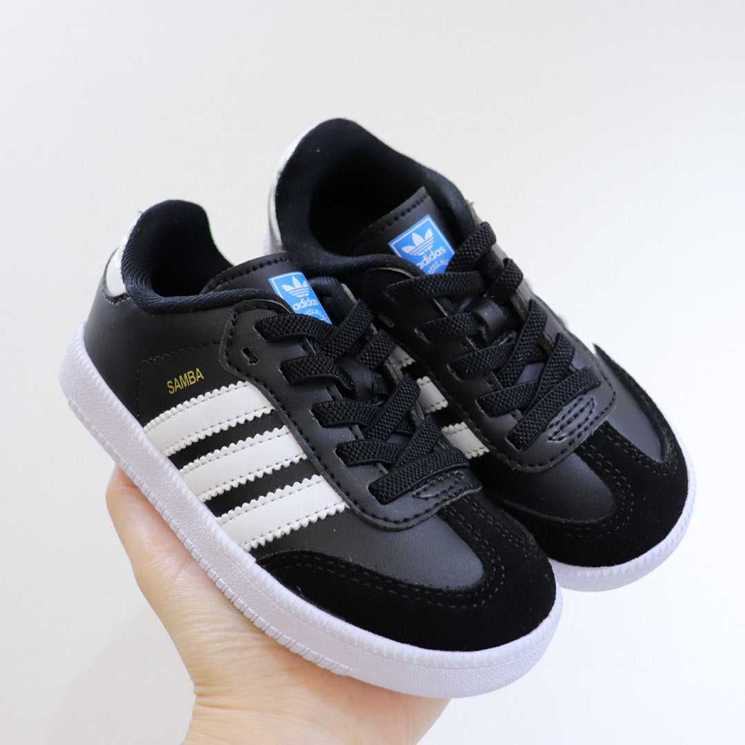Adidas children's training shoes" black, white"