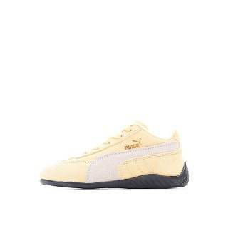 Puma racing shoes 🏎️🏎️🏎️🏎️🏎️" A light, peachy orange"
