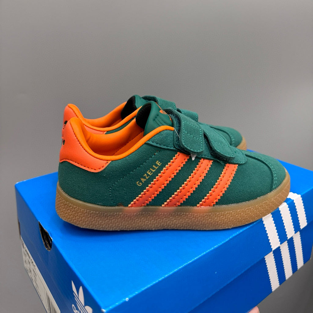 Adidas Dexter double buckle sneakers" dark green with orange"