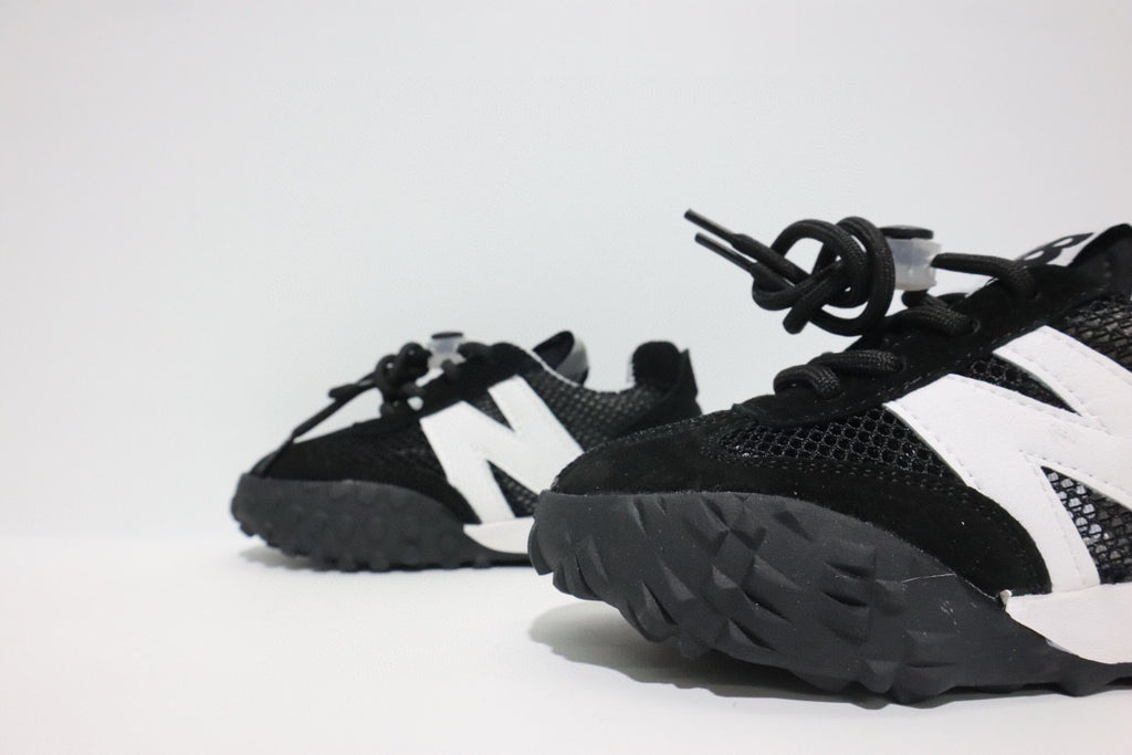 N official website synchronized parallel bars sandals " black, white"