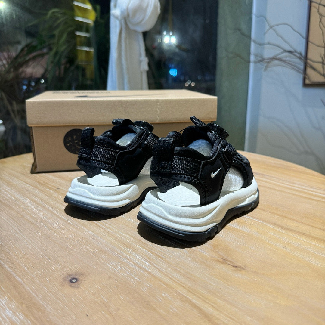 Nike closed toe rotating button sandals" black"