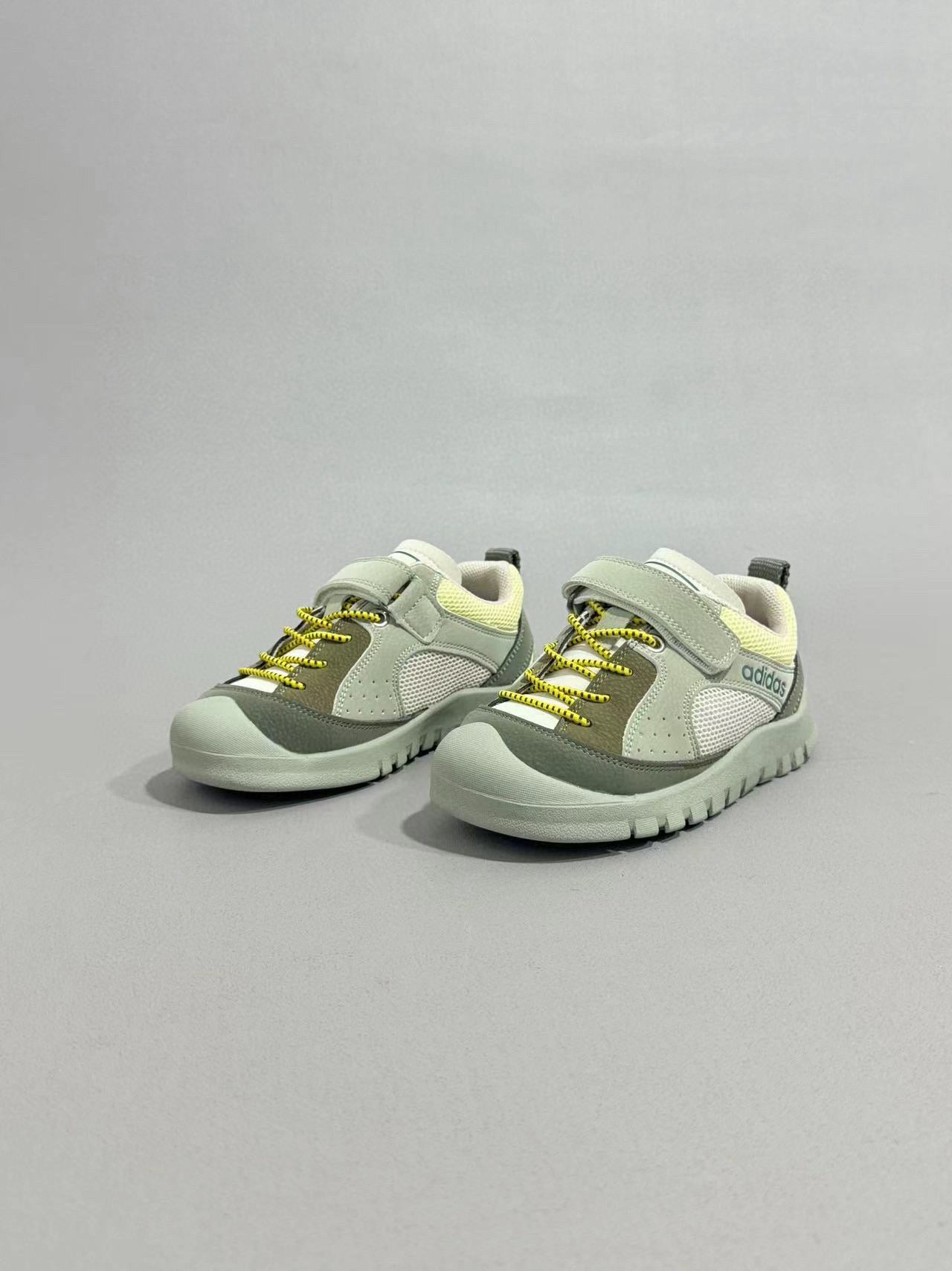 Adidas outdoor hiking shoes" muted green and grey-green.