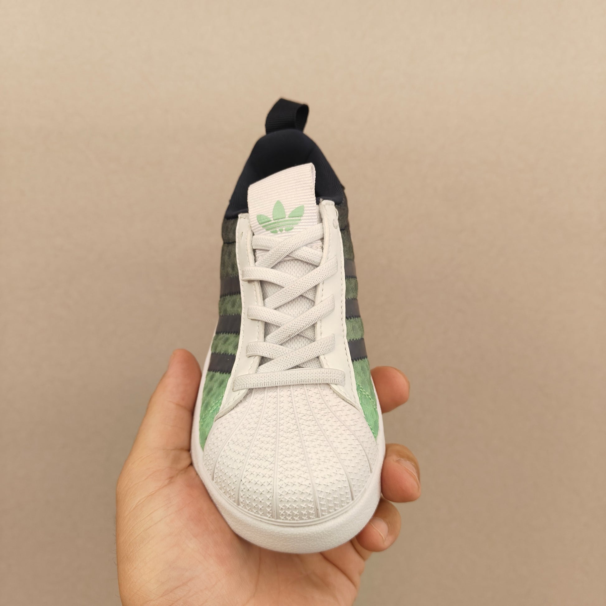 shell toe second generation" dark grey, Green, & White"