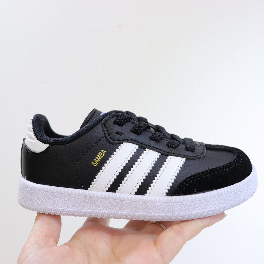 Adidas children's training shoes" black, white"