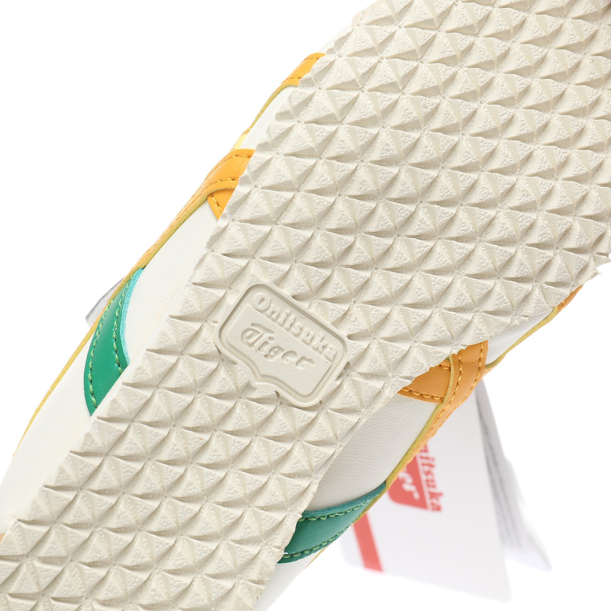 Asics Tiger" cream, orange, green"