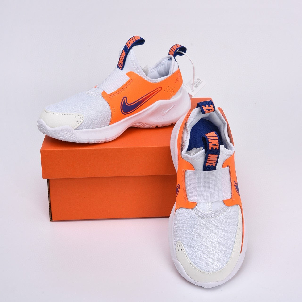 Nike slip-on running shoes"  white, orange"