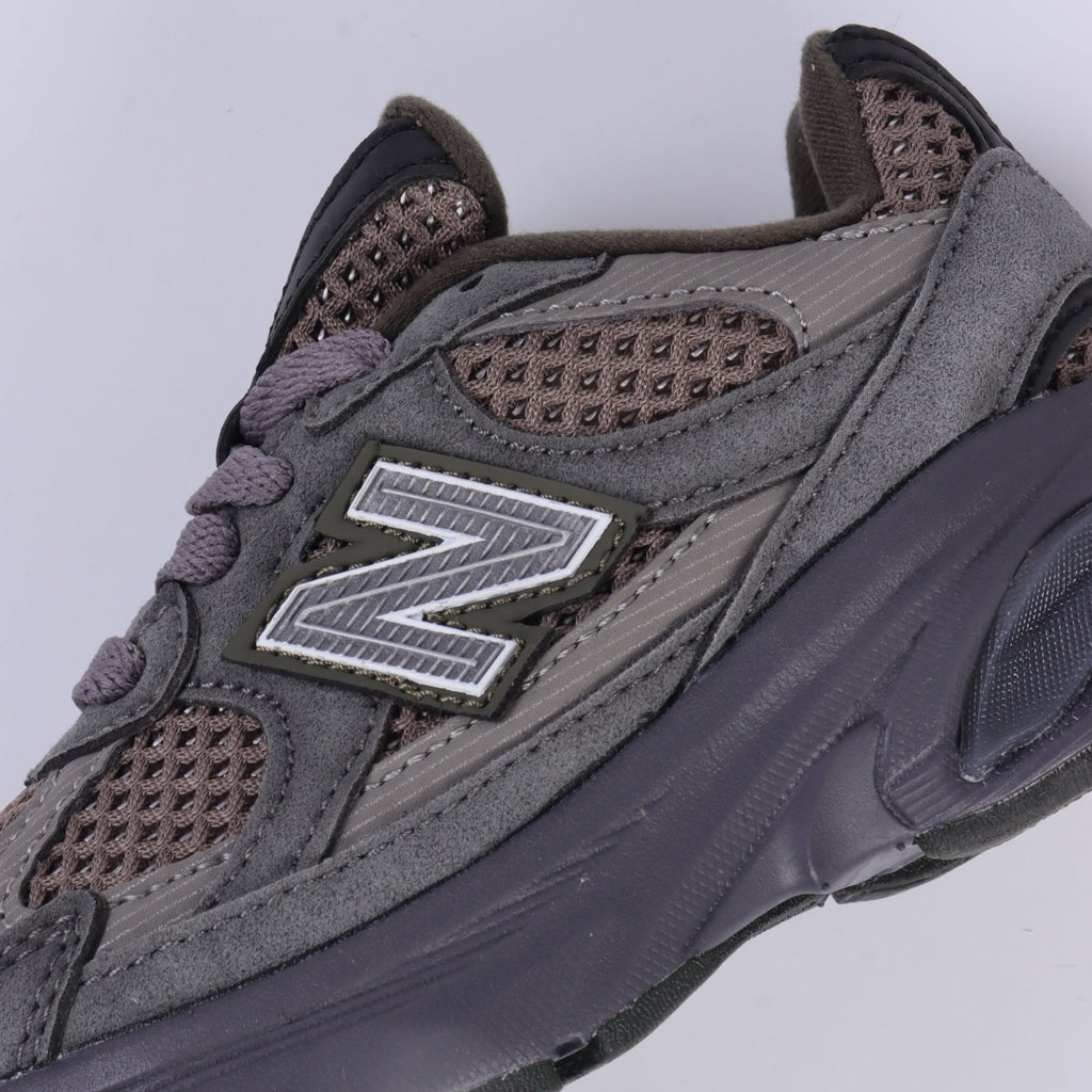 N 2010 children's shoes" Various shades of dark grey and brown"