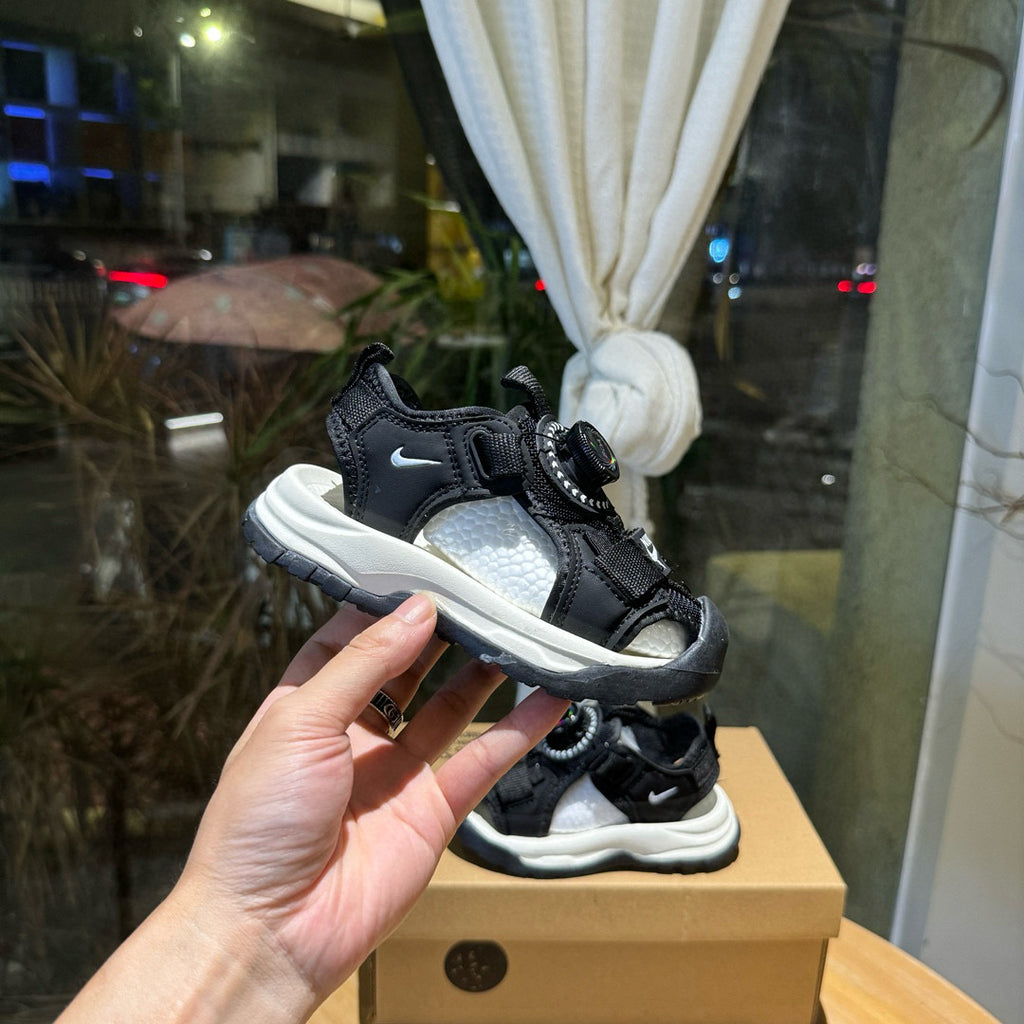 Nike closed toe rotating button sandals" black"