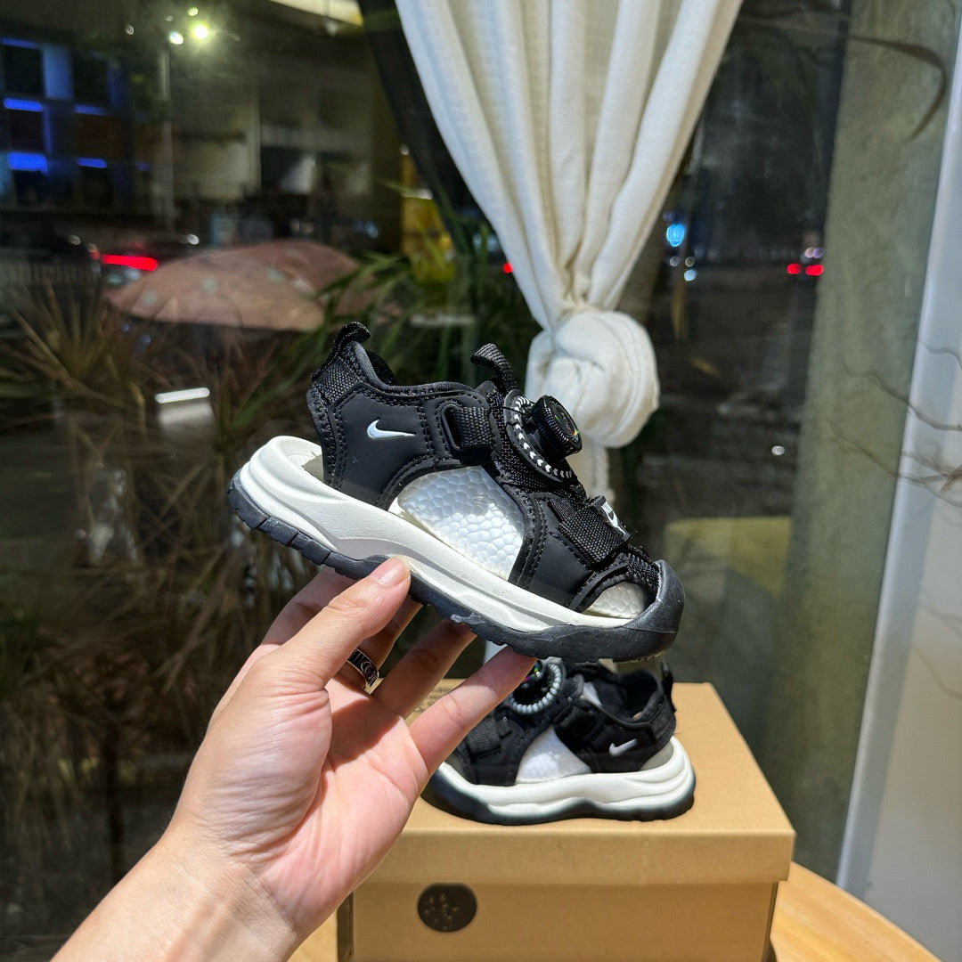 Nike closed toe rotating button sandals" black"
