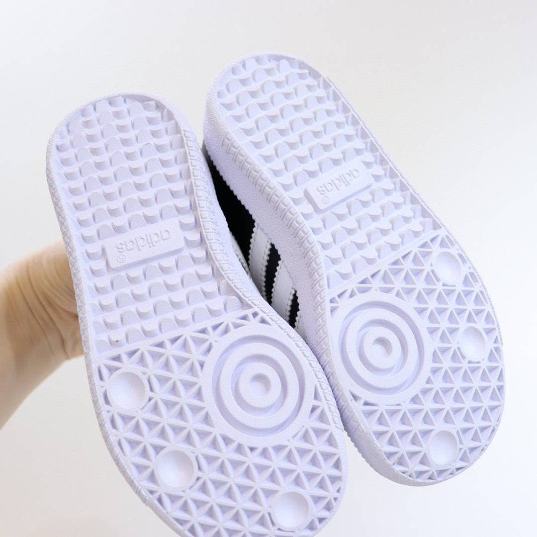 Adidas children's training shoes" black, white"