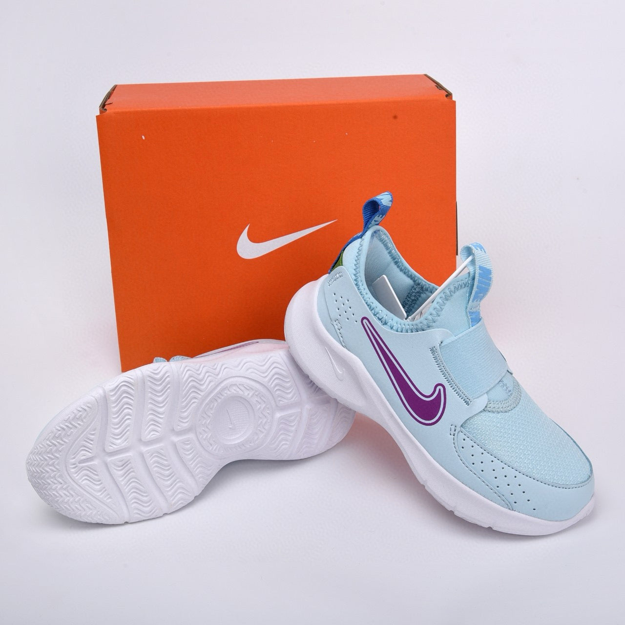 Nike slip-on running shoes" sky blue, purple"