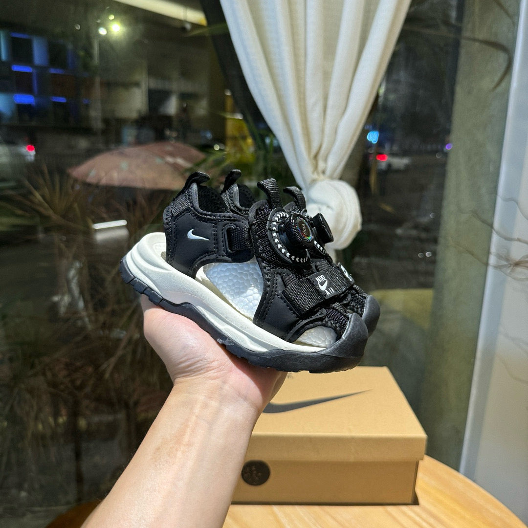 Nike closed toe rotating button sandals" black"