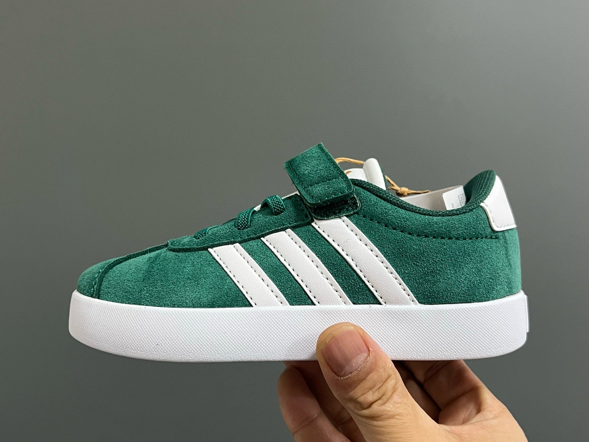 Adidas tennis shoes" dark green"