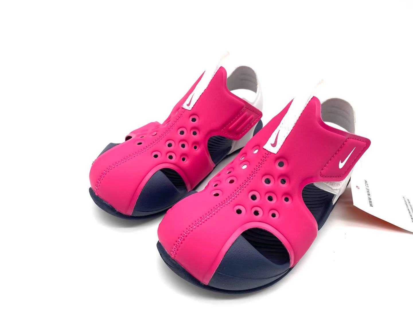 Nike Crocs "bright fuchsia, navy"