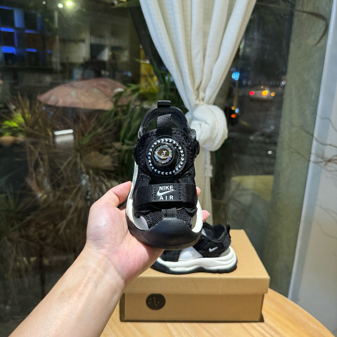 Nike closed toe rotating button sandals" black"