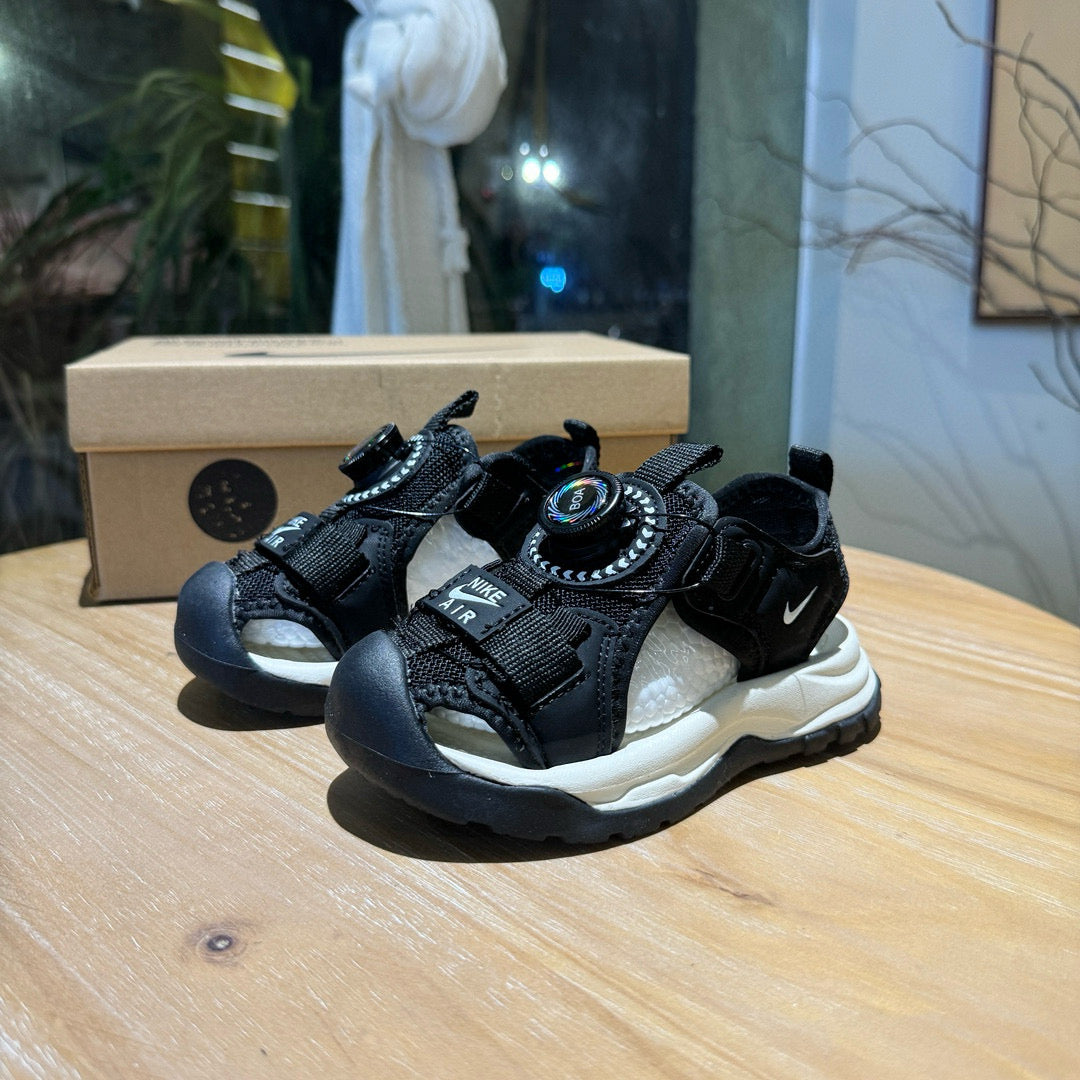 Nike closed toe rotating button sandals" black"