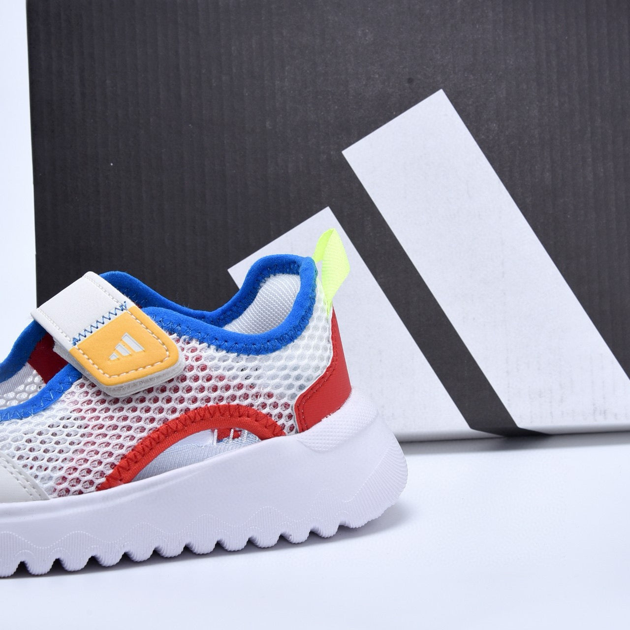 Adidas mesh single buckle sandals" white, with red and blue "