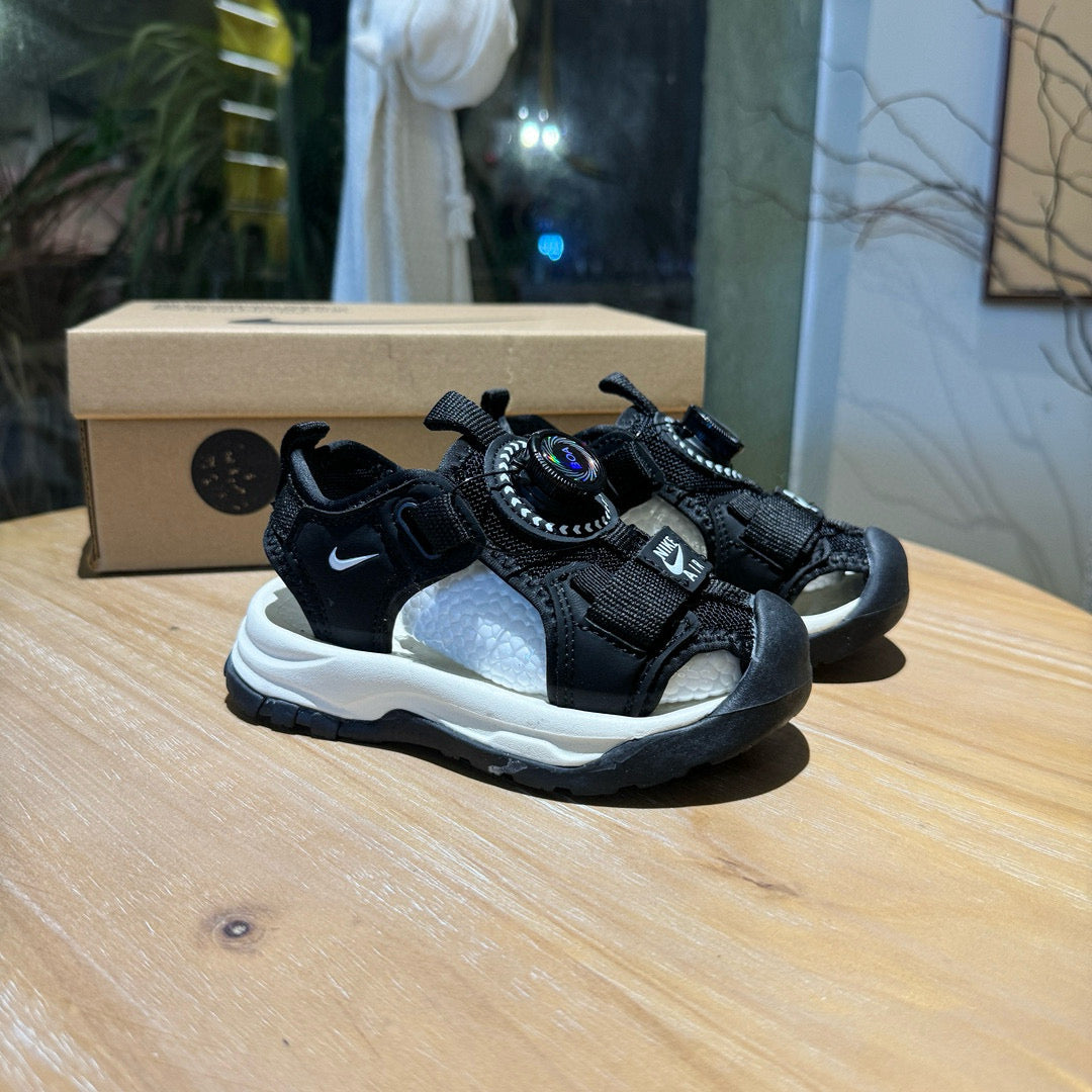 Nike closed toe rotating button sandals" black"