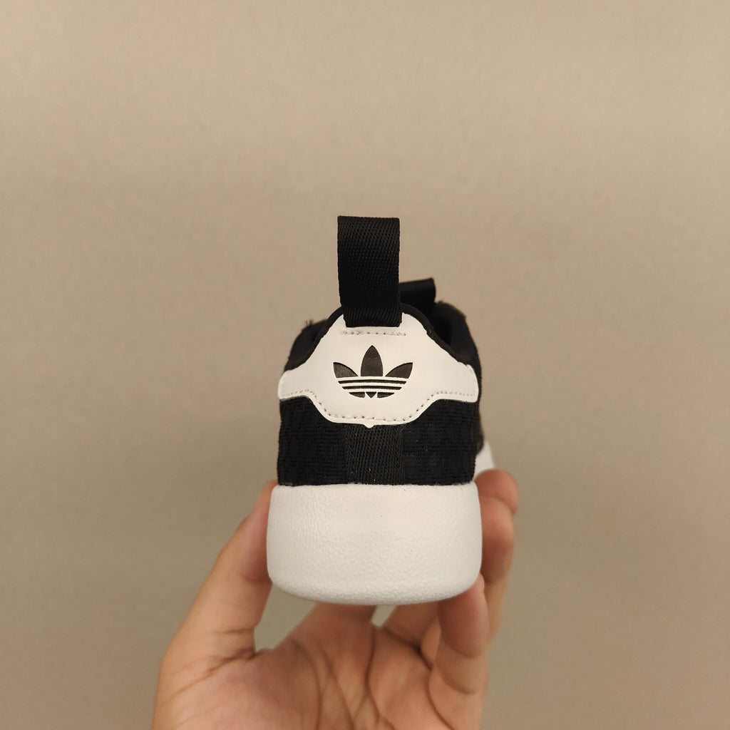 shell toe second generation" Black, white, with line"