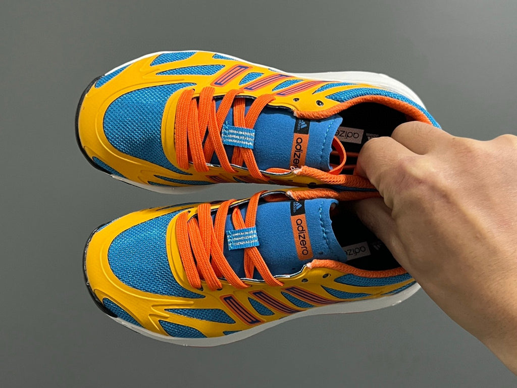 A's new children's shoelace buckle swing sports shoes" Orange, blue"